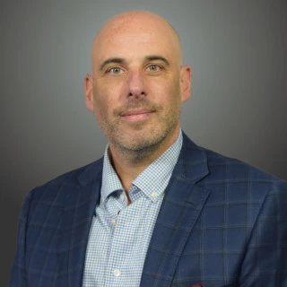Portrait photo of Dan Charney, President and CEO of Direct Recruiters
